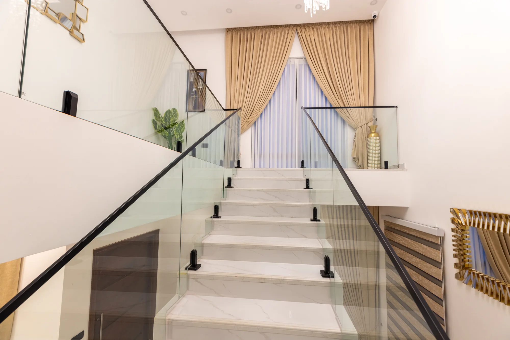 Front-facing stair with glass balustrade