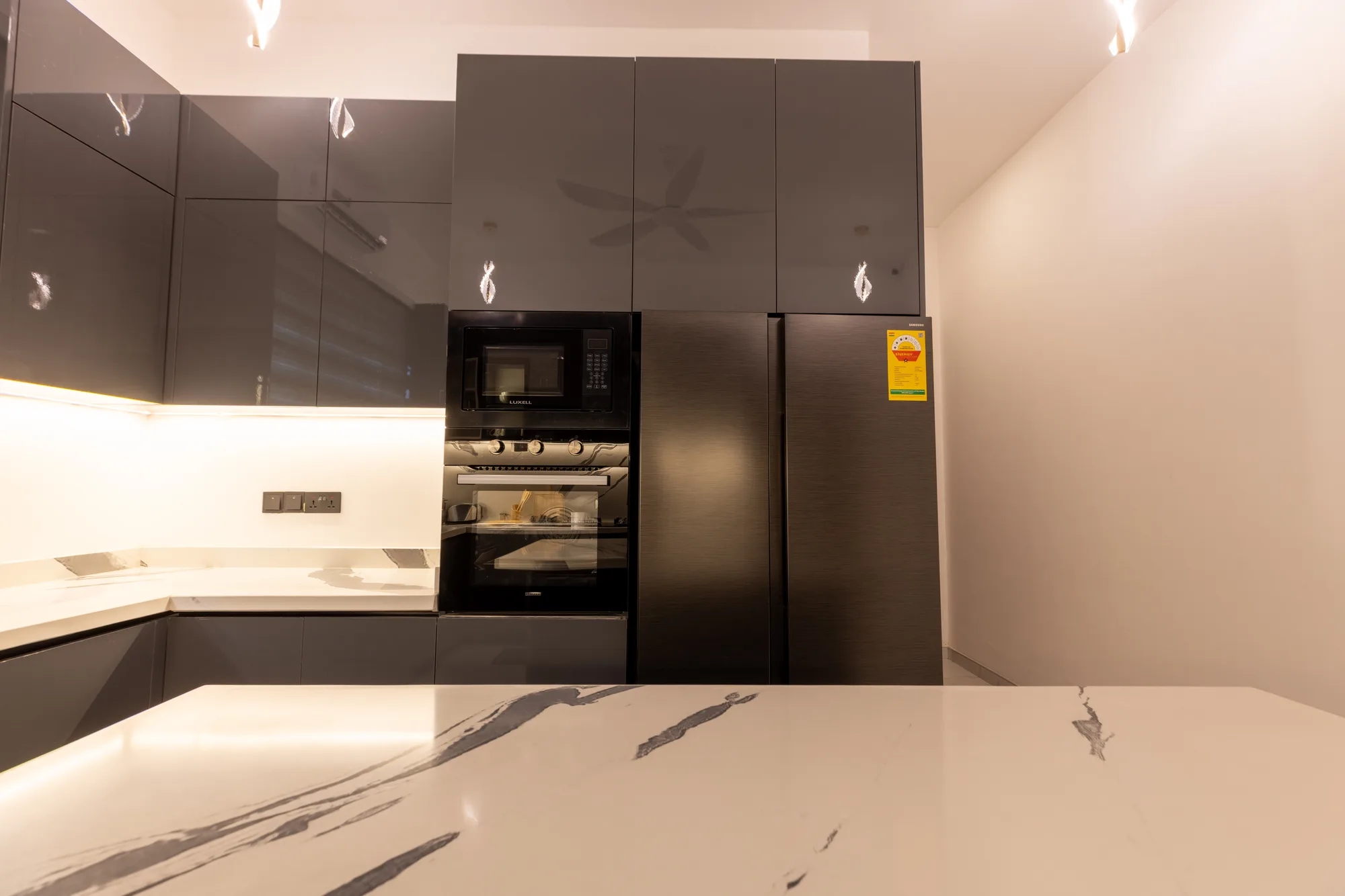 Residence Three kitchen island and working surface
