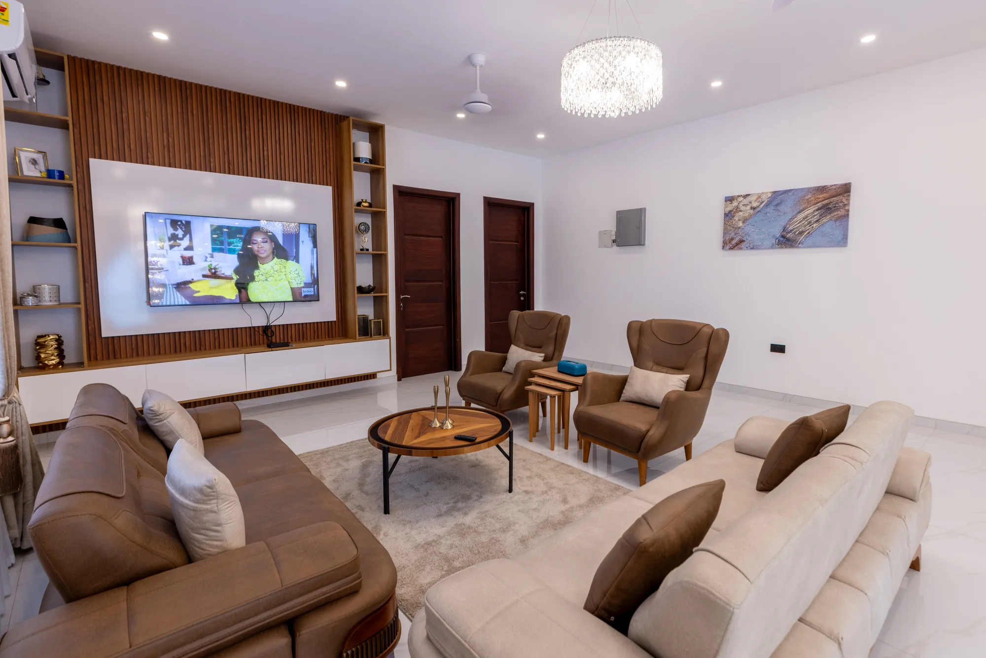 Residence Three media wall and lounge seating